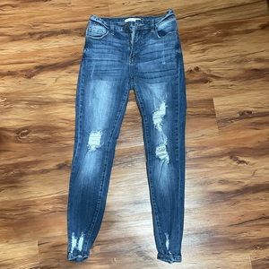 Ripped high waist blue jeans